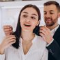 young-couple-choosing-necklace-jewelry-store